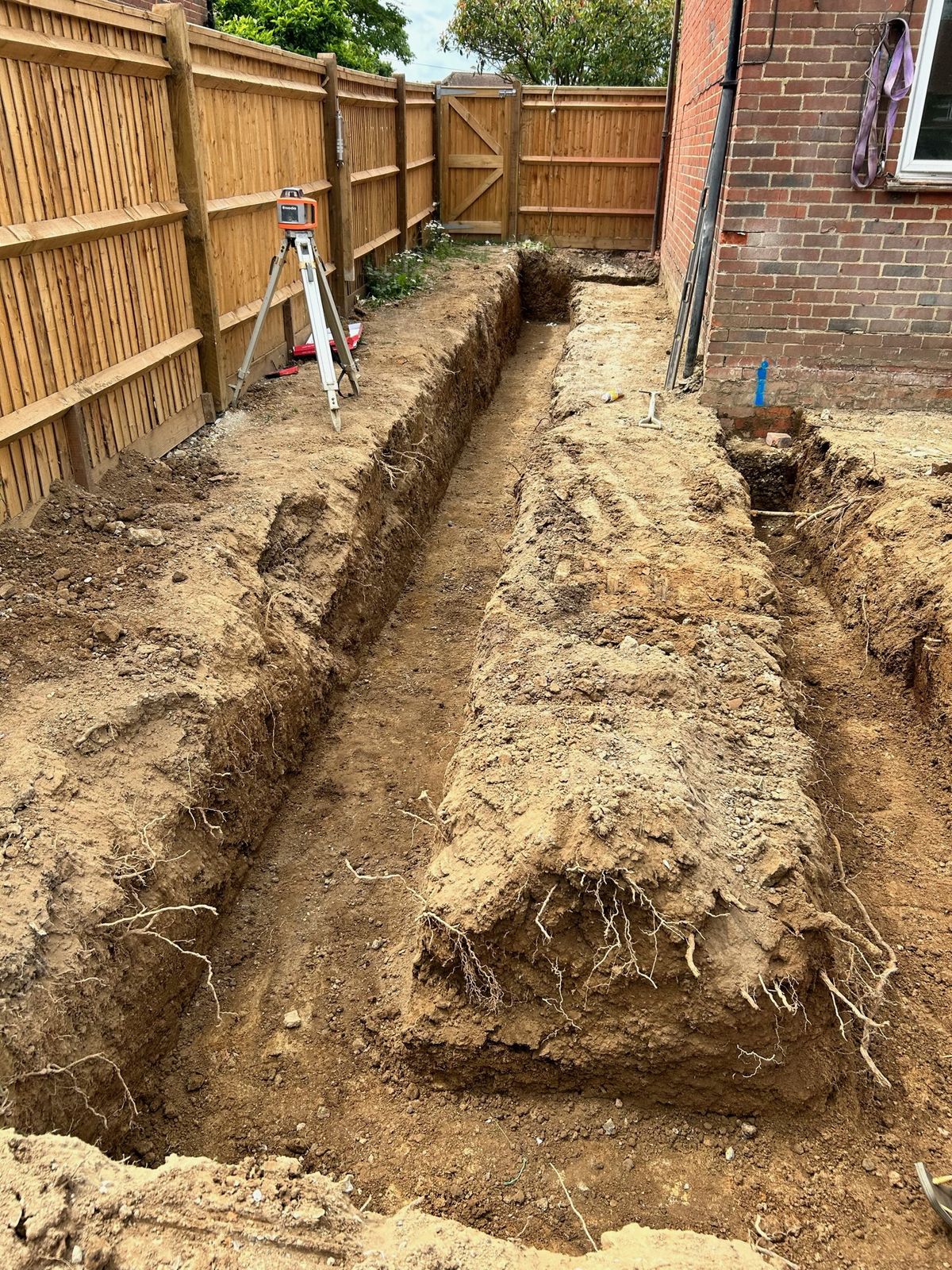 Foundation trenches excavated for a house extension