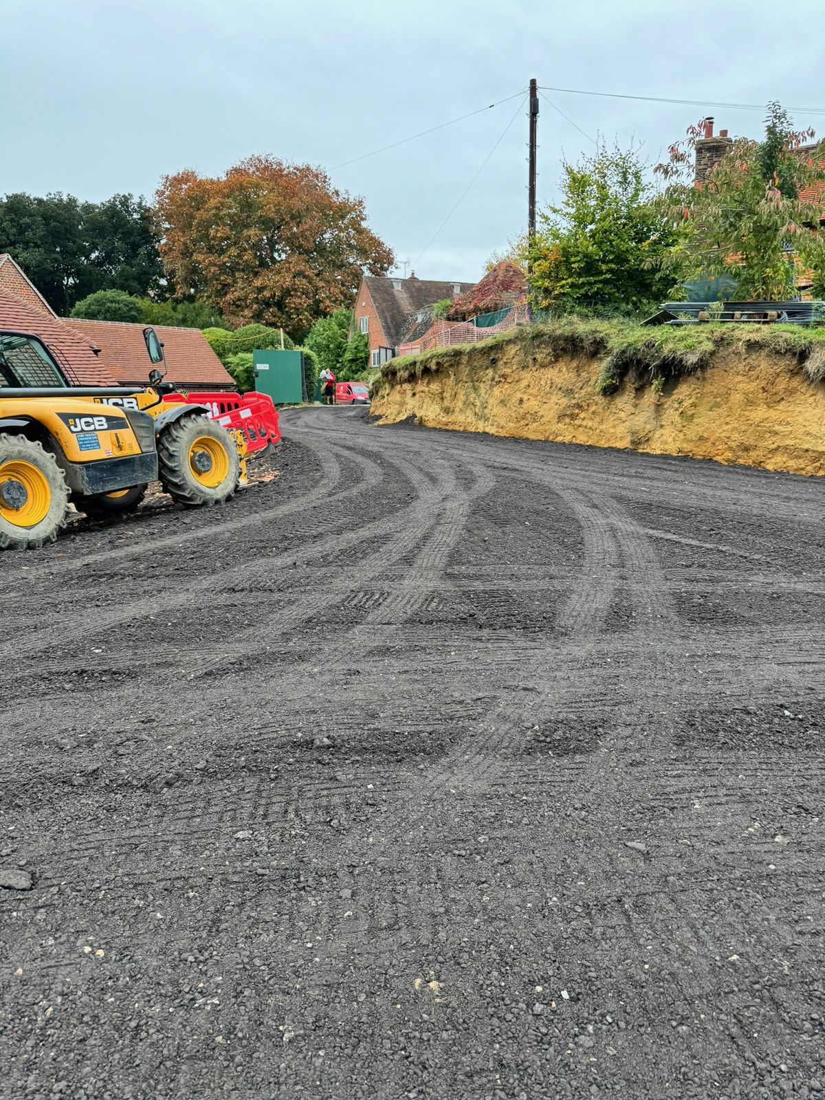 Site dumpers on a freshly surfaced road